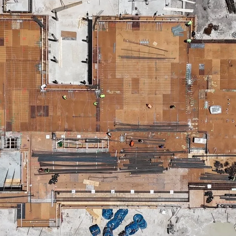 Aerial view of a large commercial slab with the plumbing rough-in in place