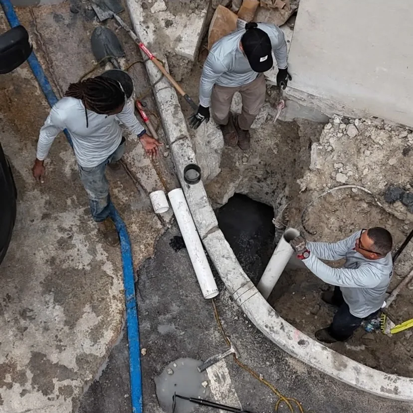 R&J crew working in an open trench running new sewer and water lines