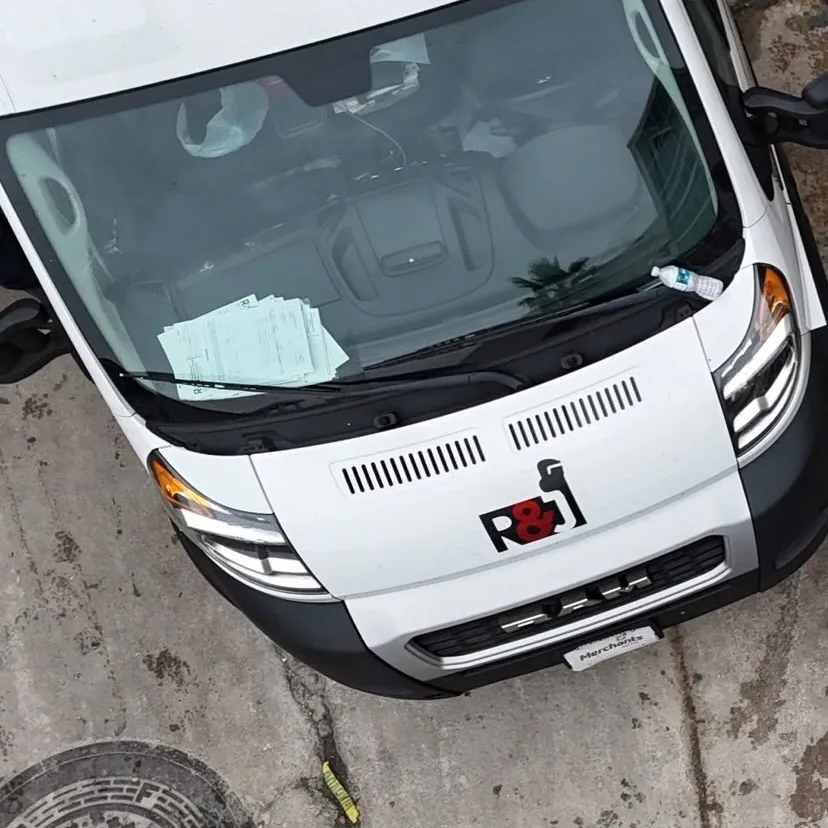 Overhead view of an R&J service van on site